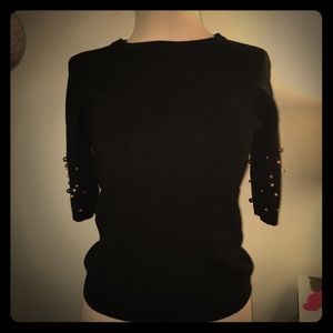 Super cute black sweater with pearled sleeves